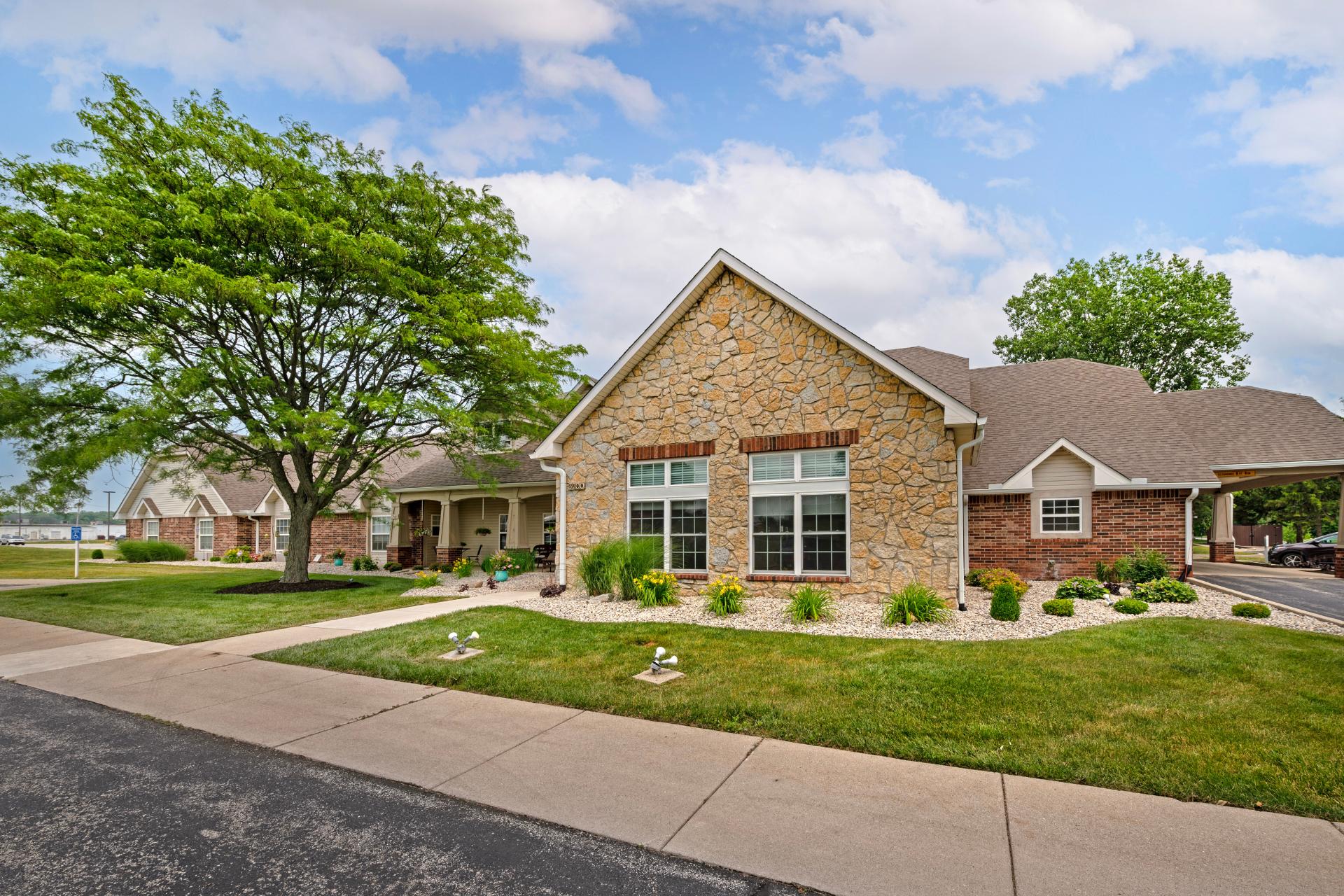 CV_richmond_entrance_web exterior entrance with covered seating and entryway